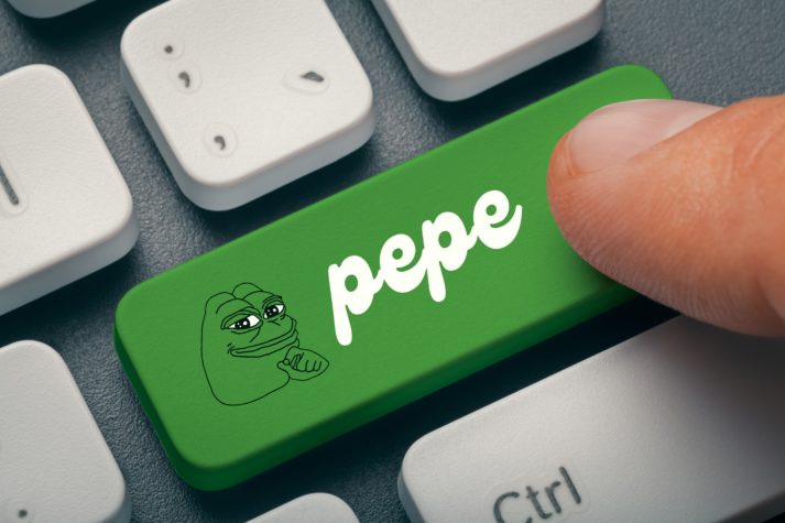 Close,Up,Photo,Of,Male,Hand,Finger,Pressing,Pepe,Memecoin